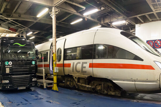Side by side: an ICE train and a truck on the Scandlines ferry from Puttgarden (in Germany) to Rødby (Denmark) (photo © Oliver Foerstner / dreamstime.com).