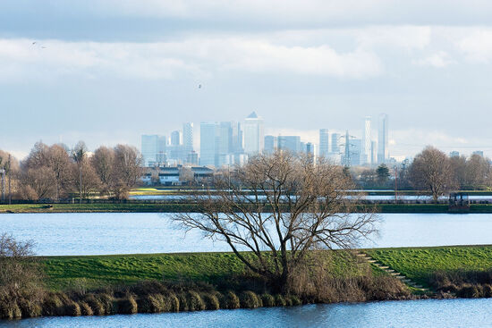 London’s Docklands and Canary Wharf area viewed across Low and High Maynard Reservoirs, part of Walthamstow Wetlands (photo © Rudolf Abraham).